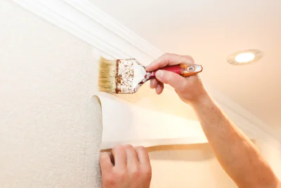 Pose de papier peint aux Pilles — revêtements muraux et toiles de verre